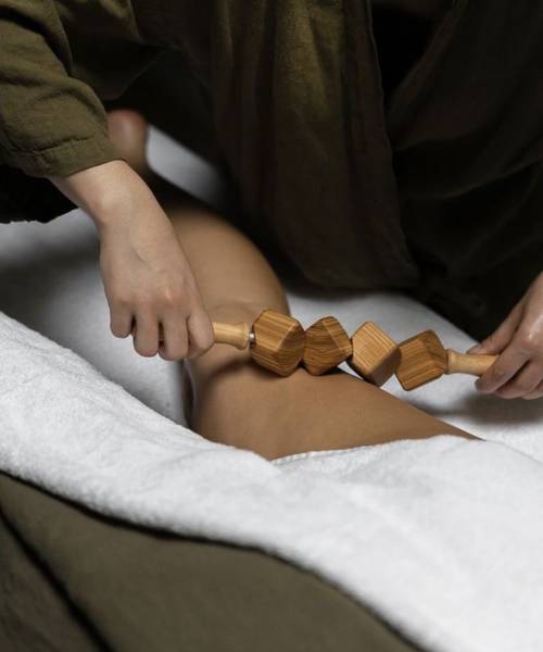 Madérothérapie massage de la cuisse pour dégonfler pour perdre du poids à Carry près de Sausset